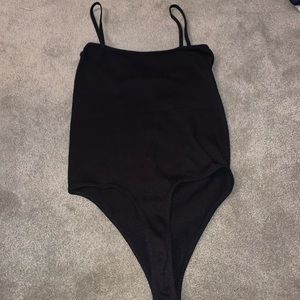 Black thong body suit